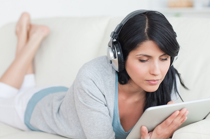 woman listening to free audiobooks online